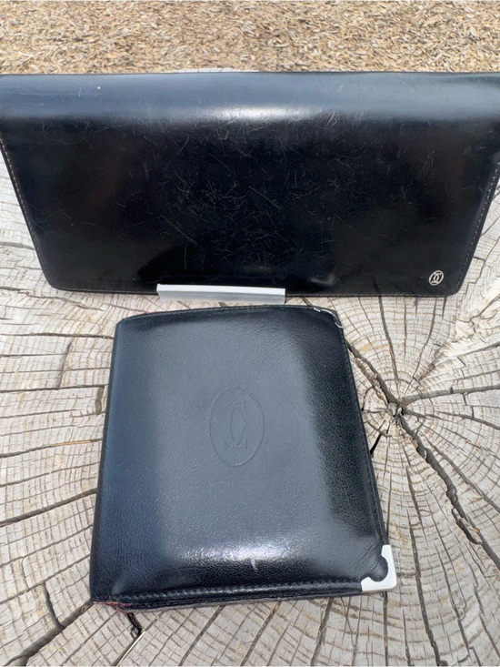 Cartier Handbags - Cartier his and hers black leather wallet set of 2 (resellers bundle)